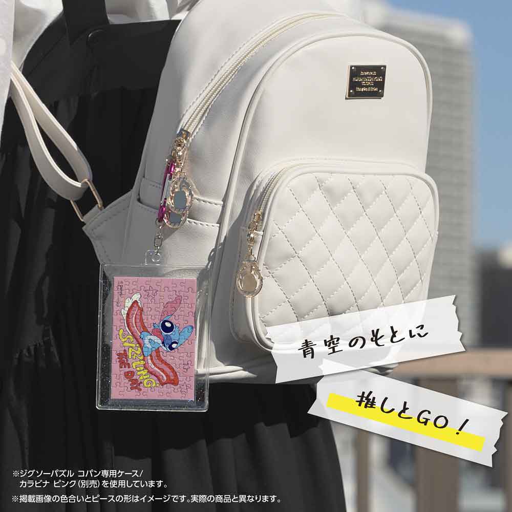 専用ケースに入れたコパンを、リュックに付けたイメージ